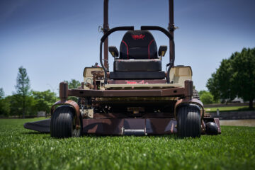 Grasshopper FrontMount commercial mower parked outside a dealership