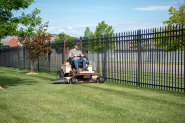 Commercial operator using a Grasshopper FrontMount mower