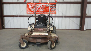 Grasshopper zero-turn mower displayed indoors at a dealership